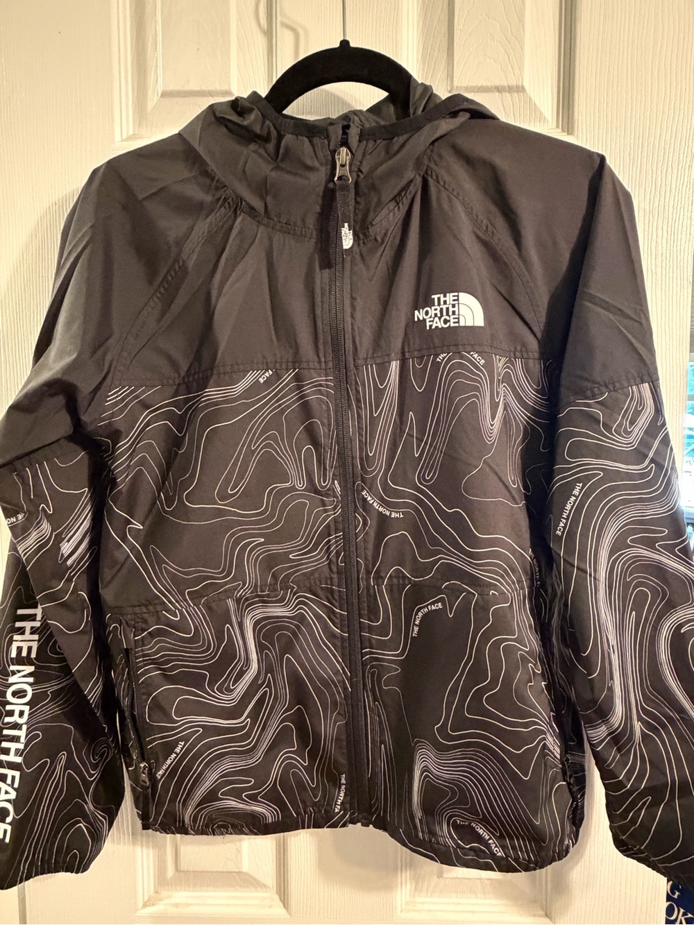 The North Face Black Hooded Windbreaker with White Topographic Print